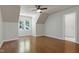 Bedroom with wood floors, window, and a ceiling fan at 108 Ellsworth Pl, Chapel Hill, NC 27516