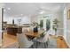 Elegant dining room connects to the kitchen with hardwood floors and natural light at 108 Ellsworth Pl, Chapel Hill, NC 27516