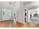 Open foyer showcasing the front door, powder room, and an entrance to the bedroom at 108 Ellsworth Pl, Chapel Hill, NC 27516