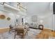 Spacious living room with hardwood floors, fireplace, comfortable seating, and a view of the entryway at 108 Ellsworth Pl, Chapel Hill, NC 27516