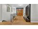 Elegant foyer with hardwood floors, double doors, a decorative screen, and sophisticated decor at 10909 Raven Rock Dr, Raleigh, NC 27614