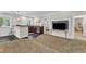 An inviting living room showing the wet bar that connects to a larger room, offering versatile living and entertaining options at 10909 Raven Rock Dr, Raleigh, NC 27614