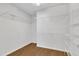 Walk-in closet with custom shelving, maximizing storage space and organization at 113 Dowington Ln, Cary, NC 27519