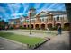The community has a lovely lawn bowling area with a well-maintained building in the background at 113 Dowington Ln, Cary, NC 27519