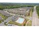 Overhead view of a townhome community featuring a sparkling pool and convenient resident parking at 1136 Longitude Dr, Durham, NC 27713