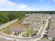 Aerial view of a townhome community with beautiful green spaces and tree-lined streets at 1136 Longitude Dr, Durham, NC 27713