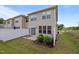 Private backyard with a small concrete patio, partial fence, and green space, offering a cozy outdoor retreat at 1136 Longitude Dr, Durham, NC 27713