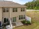 Cozy backyard with a small patio, fence, and landscaping for a relaxing outdoor space at 1136 Longitude Dr, Durham, NC 27713