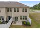Cozy backyard with a small patio, fence, and landscaping for a relaxing outdoor space at 1136 Longitude Dr, Durham, NC 27713