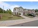Inviting townhome featuring a one-car garage, neutral siding, and well-maintained landscaping at 1136 Longitude Dr, Durham, NC 27713