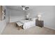 Bright and airy main bedroom with neutral tones, carpet floors and ample natural light at 1136 Longitude Dr, Durham, NC 27713