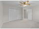 Neutral bedroom with closet and attached door, offering comfort and function at 12325 Amoretto Way, Raleigh, NC 27613