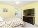 Bright bedroom with a large window, dresser, and comfortable bed, perfect for relaxing after a long day at 1290 Pyrtle Dr, Graham, NC 27253