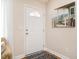 Inviting entryway featuring a white door and tasteful decor at 1290 Pyrtle Dr, Graham, NC 27253
