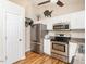 Modern kitchen with stainless steel appliances, bright cabinets, and ample counter space for cooking at 1290 Pyrtle Dr, Graham, NC 27253