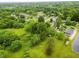 Lush trees surround houses in this community creating a verdant, welcoming neighborhood at 1309 Jackson St, Burlington, NC 27217