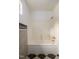 Bathroom featuring tiled walls and a bathtub/shower combo at 1309 Jackson St, Burlington, NC 27217