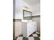 Bathroom featuring a white vanity, mirror, and tiled floors at 1309 Jackson St, Burlington, NC 27217