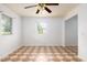 Well-lit living area with tiled floors and bright white walls, creating a welcoming atmosphere at 1309 Jackson St, Burlington, NC 27217