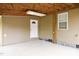 Covered patio area with a concrete floor and view of backyard at 1309 Jackson St, Burlington, NC 27217