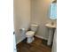 Modern half bath with pedestal sink and contemporary fixtures at 132 Rockfall Way, Rocky Mount, NC 27803