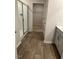 Bathroom features walk in shower, vanity, and a door into closet at 132 Rockfall Way, Rocky Mount, NC 27803