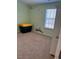 Carpeted bedroom with closet at 132 Rockfall Way, Rocky Mount, NC 27803