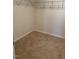 Walk-in closet features carpet, shelving, and ample space for storage at 132 Rockfall Way, Rocky Mount, NC 27803