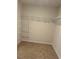 Spacious walk-in closet features an abundance of shelving space for optimal organization at 132 Rockfall Way, Rocky Mount, NC 27803