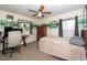 Bedroom with a desk, bed, window seat, and natural light at 149 Cinder Cross Way, Garner, NC 27529