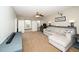 Bonus room with couch, TV console, cabinets, and desk at 149 Cinder Cross Way, Garner, NC 27529