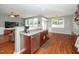 Open concept design shows the kitchen open to the living room, creating an inviting and social space at 149 Cinder Cross Way, Garner, NC 27529
