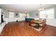 Living area with hardwood floors featuring a dining area and a separate seating area at 149 Cinder Cross Way, Garner, NC 27529