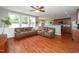 Open concept living room shows wood floors and open sight lines into the kitchen at 149 Cinder Cross Way, Garner, NC 27529