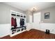 Well-organized mud room with storage, coat hooks, seating and a drop zone for shoes at 149 Cinder Cross Way, Garner, NC 27529