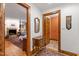 Inviting bedroom with fireplace and a doorway view to the en suite bathroom at 1513 Dellwood Dr, Raleigh, NC 27607