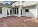 Wooden back deck offering outdoor space and multiple access points to the home at 1601 Castalia Dr, Cary, NC 27513