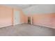 Bedroom featuring plush carpeting and a doorway to an attic space at 1601 Castalia Dr, Cary, NC 27513
