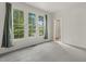 Light-filled room with large windows providing ample natural light at 1601 Castalia Dr, Cary, NC 27513