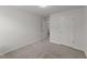Comfortable bedroom with neutral carpet and ample natural light at 19 Willow Green Dr, Clayton, NC 27527
