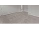 Bright bedroom features neutral carpet, and base molding. Ready for you to make it your own at 19 Willow Green Dr, Clayton, NC 27527