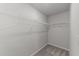 Walk-in closet has a built-in rack shelf for your clothing and personal storage needs at 19 Willow Green Dr, Clayton, NC 27527