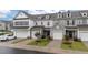 Charming townhomes with two-car garages and green lawns at 19 Willow Green Dr, Clayton, NC 27527