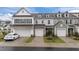 Charming townhomes with two-car garages, and well manicured lawns at 19 Willow Green Dr, Clayton, NC 27527