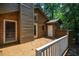 A wooden back deck and backyard provide ample space for outdoor activities at 200 W Woodcroft Pkwy # 52A, Durham, NC 27713