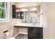 This Bathroom features a walk-in shower, modern fixtures, and sink with vanity at 200 W Woodcroft Pkwy # 52A, Durham, NC 27713