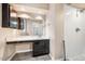 Bathroom featuring a walk-in shower with modern fixtures, vanity and lots of counter space at 200 W Woodcroft Pkwy # 52A, Durham, NC 27713