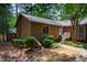 Charming brick home with well-maintained landscaping and inviting front entrance at 200 W Woodcroft Pkwy # 52A, Durham, NC 27713