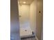 Newly tiled walk-in shower featuring white subway tiles and a modern shower head, perfect for relaxation at 200 W Woodcroft Pkwy # 52A, Durham, NC 27713