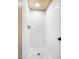 Modern walk-in shower featuring subway tile, new fixtures, and a glass door at 200 W Woodcroft Pkwy # 52A, Durham, NC 27713